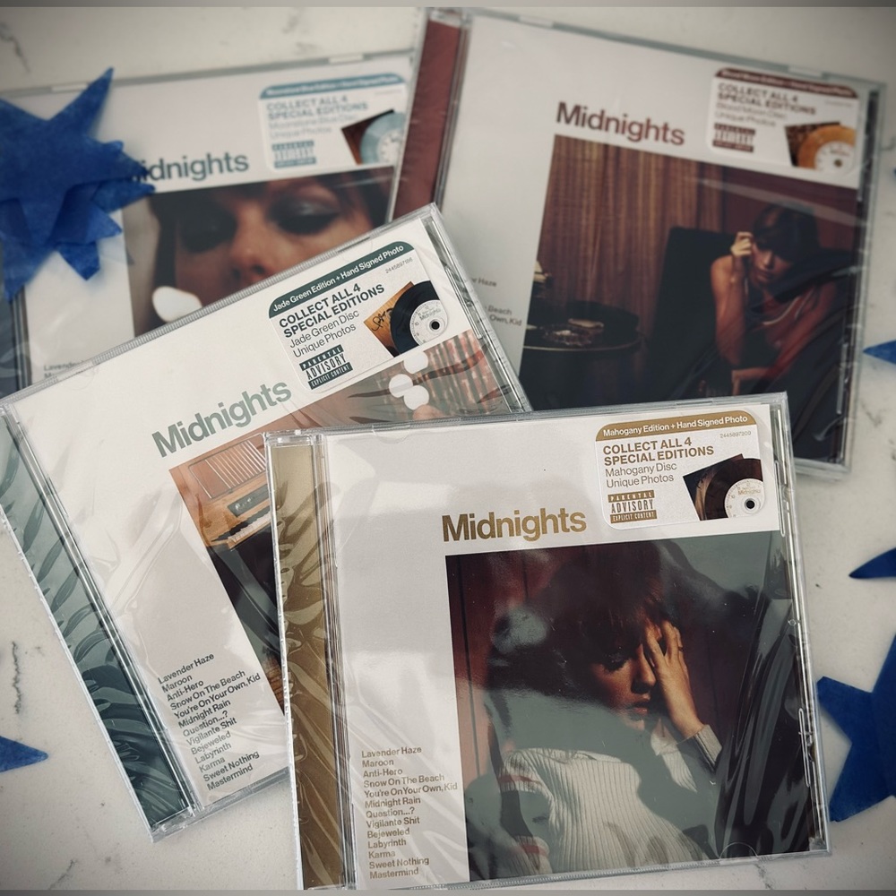 Complete set of Taylor Swift’s Midnights CDs with HAND SIGNED photos in each.